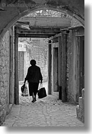 images/Europe/Croatia/Trogir/NarrowStreets/woman-carrying-bags-bw.jpg
