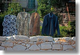 images/Europe/Croatia/VeliLosinj/hanging-shirts-n-stone-wall.jpg