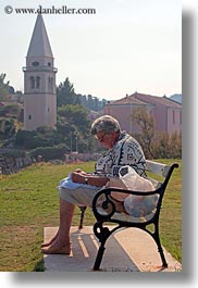 images/Europe/Croatia/VeliLosinj/woman-on-bench-by-bell_tower-3.jpg