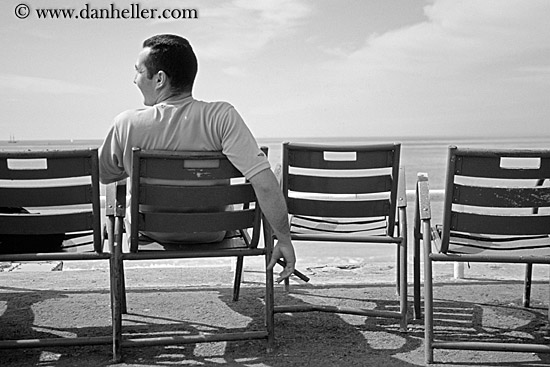 cigar-man-watching-sea-bw.jpg