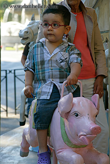 boy-on-pig-ride-merry_go_round.jpg