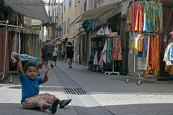 boy-sitting-in-street.jpg