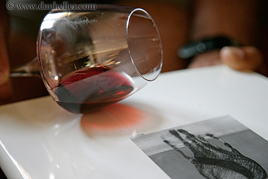 tipped-glass-of-red-wine.jpg