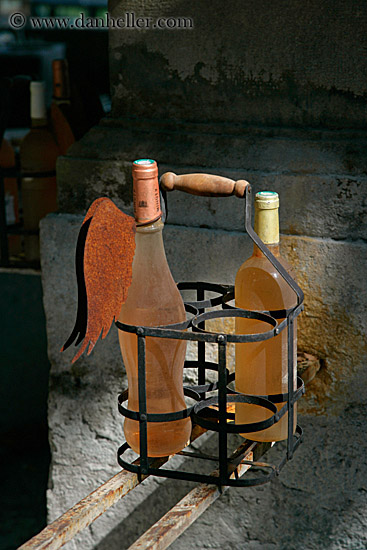 old-wine-bottles-n-iron-carrier.jpg