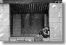 images/Europe/France/Provence/StPaul/woman-reading-in-stone-frame.jpg