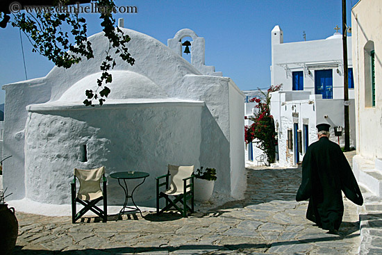 priest-walking-by-church.jpg