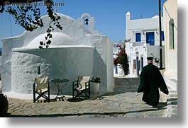 images/Europe/Greece/Amorgos/Churches/priest-walking-by-church.jpg