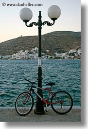 images/Europe/Greece/Amorgos/Misc/bike-lamp_post-n-ocean.jpg