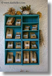 images/Europe/Greece/Amorgos/Misc/brown-bags-of-spices-on-wood-shelf-1.jpg