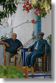 images/Europe/Greece/Amorgos/People/old-men-sitting-under-flowers.jpg