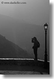images/Europe/Greece/Amorgos/People/photographer-lamp_post-n-mtns-bw-2.jpg