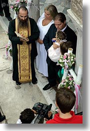 images/Europe/Greece/Athens/Baptism/priest-parents-n-baby-1.jpg