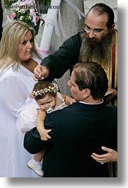 images/Europe/Greece/Athens/Baptism/priest-parents-n-baby-3.jpg