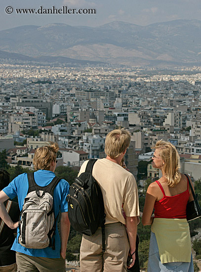 three-people-viewing-cityscape.jpg