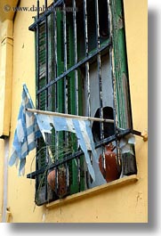 images/Europe/Greece/Athens/DoorsWindows/torn-greek-flags-in-window.jpg
