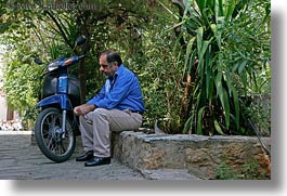 images/Europe/Greece/Athens/People/sad-man-n-blue-moped.jpg