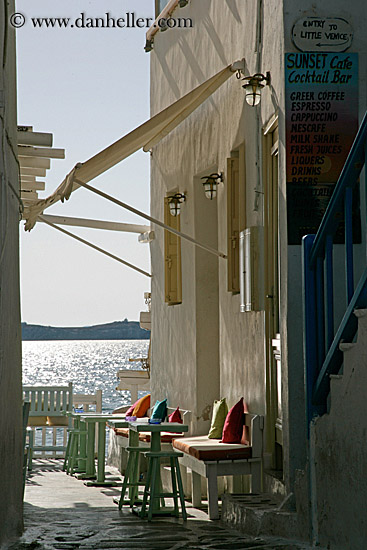 bldg-w-colorful-pillows-on-bench.jpg