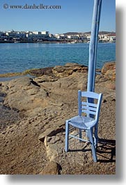 blues, chairs, europe, greece, mykonos, poles, rocks, vertical, photograph