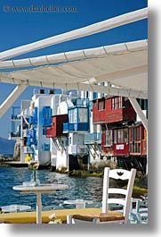 images/Europe/Greece/Mykonos/Chairs/chair-table-flowers-w-waterfront-bldgs-2.jpg