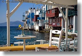 images/Europe/Greece/Mykonos/Chairs/chair-table-flowers-w-waterfront-bldgs.jpg