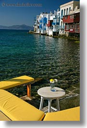 images/Europe/Greece/Mykonos/Misc/yellow-benches-flower-n-bldgs-facing-water.jpg