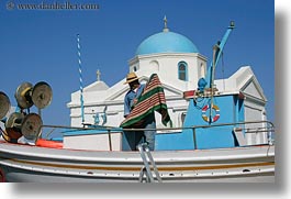 images/Europe/Greece/Mykonos/People/man-on-boat-w-blue-dome-church-2.jpg