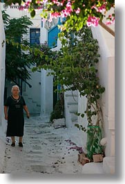 images/Europe/Greece/Mykonos/People/old-woman-walking-in-alley.jpg