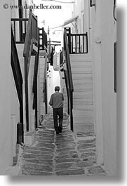 images/Europe/Greece/Mykonos/Stairs/man-walking-by-stairs-1-bw.jpg