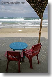 images/Europe/Greece/Naxos/Chairs/red-coca_cola-chairs-w-blue-table-on-beach.jpg
