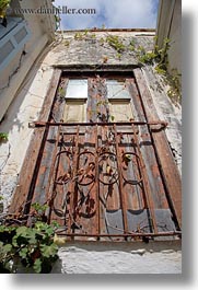 images/Europe/Greece/Naxos/DoorsWins/old-wood-door-w-rusted-gate-upview.jpg