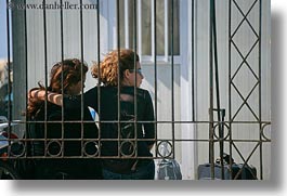 images/Europe/Greece/Naxos/People/red-hair-couple-behind-iron-bars.jpg