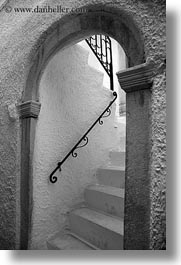 images/Europe/Greece/Naxos/Stairs/stairs-n-black-iron-railing-thru-arch-bw.jpg