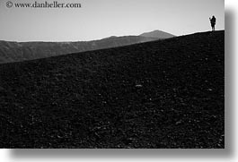 black and white, caldron, europe, greece, hikers, hills, horizontal, rockies, santorini, silhouettes, photograph
