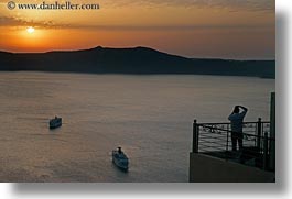 images/Europe/Greece/Santorini/Scenics/man-photographing-sunset-w-cruise-ships.jpg