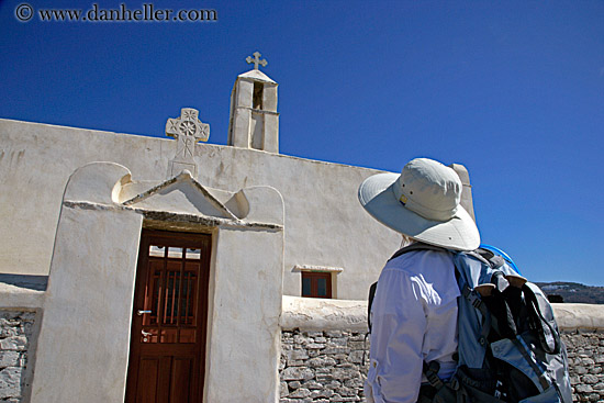 woman-looking-at-church-gate-n-bell_tower.jpg