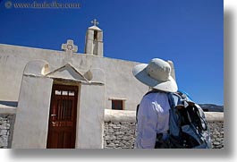 images/Europe/Greece/Tinos/Churches/woman-looking-at-church-gate-n-bell_tower.jpg