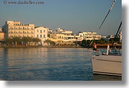 images/Europe/Greece/Tinos/Harbor/woman-on-boat-w-town.jpg