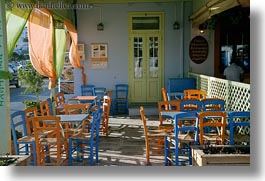 images/Europe/Greece/Tinos/Misc/blue-n-orange-chairs-w-green-door-n-curtains.jpg