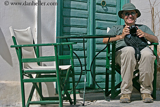 howard-w-camera-in-green-chair-1.jpg