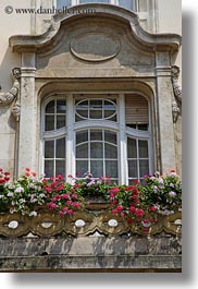 images/Europe/Hungary/Budapest/Buildings/ornate-window-n-flowers.jpg