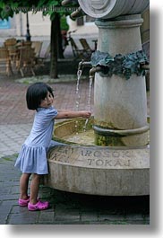 images/Europe/Hungary/Tarcal/People/little-girl-washing-hands-in-fountain-water-1.jpg