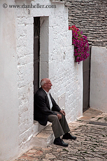 man-sitting-in-doorway.jpg