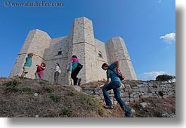 images/Europe/Italy/Puglia/Andria/CastelDelMonte/hikers-n-octogonal-castle-1.jpg