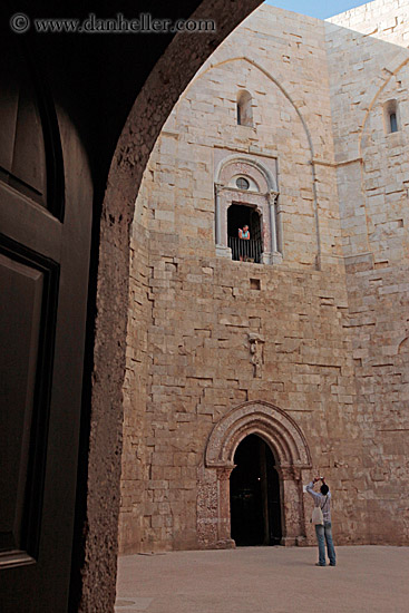 man-photographing-woman-in-castle.jpg