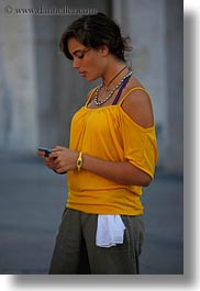 images/Europe/Italy/Puglia/Lecce/People/woman-in-yellow-w-cell-phone.jpg