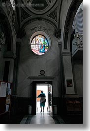 images/Europe/Italy/Puglia/Noci/Church/woman-n-door-w-stained-glass-window.jpg