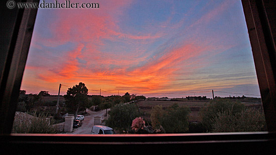 colorful-cloud-sunset-thru-window.jpg