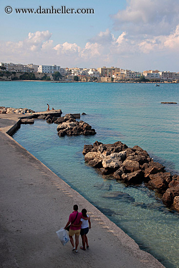 couple-walking-by-seaside-1.jpg