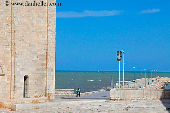 man-walking-bike-n-long-pier.jpg