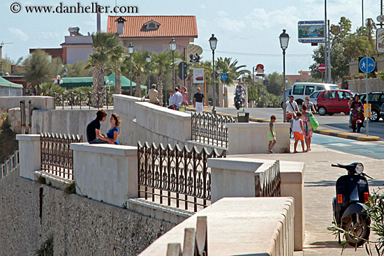 teenage-couple-on-seaside-wall-2.jpg